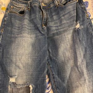 Medium wash straight legged jegging jeans